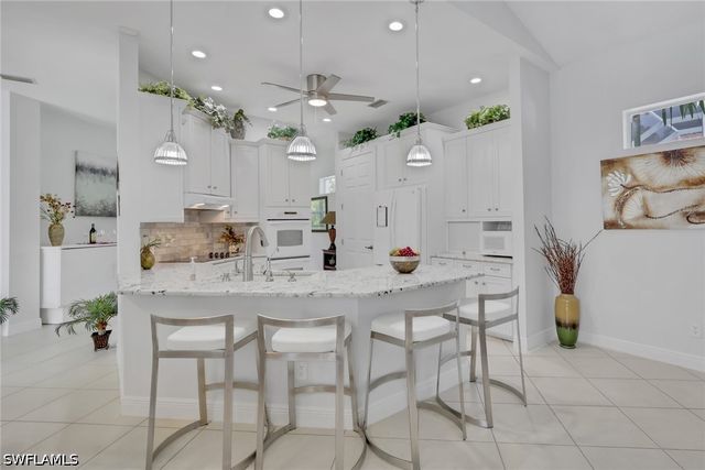 516 Eagle Creek DR, Naples, FL 34113