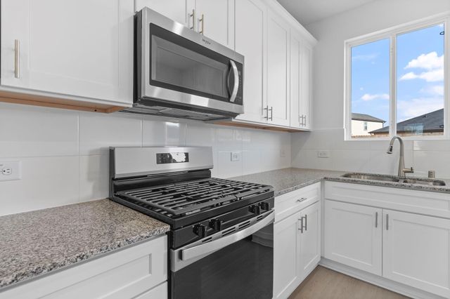 411 Ruby Ford Drive, Cove, TX 77523