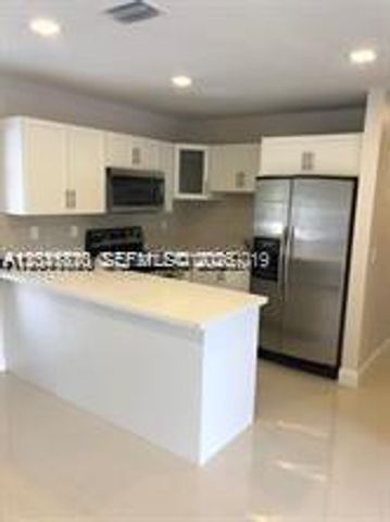 1575 NW 127th St ., North Miami, FL 33167