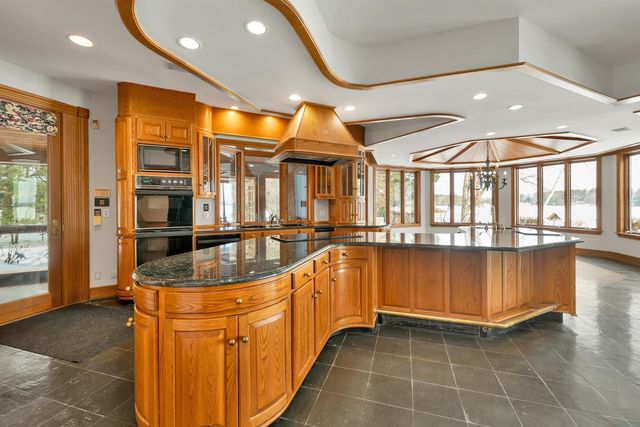 211 Dockham Shore Road, Gilford, NH 03249