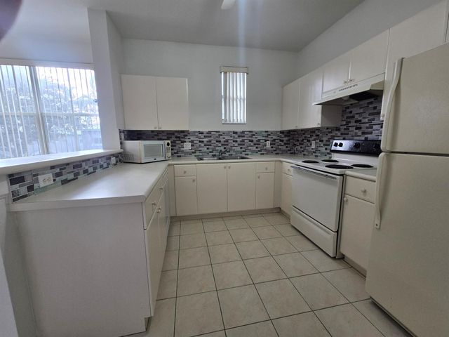 2128 Shoma Drive, Royal Palm Beach, FL 33414