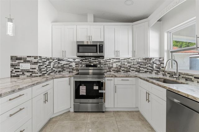 9507 CAMDEN HILL COURT, Tampa, FL 33615