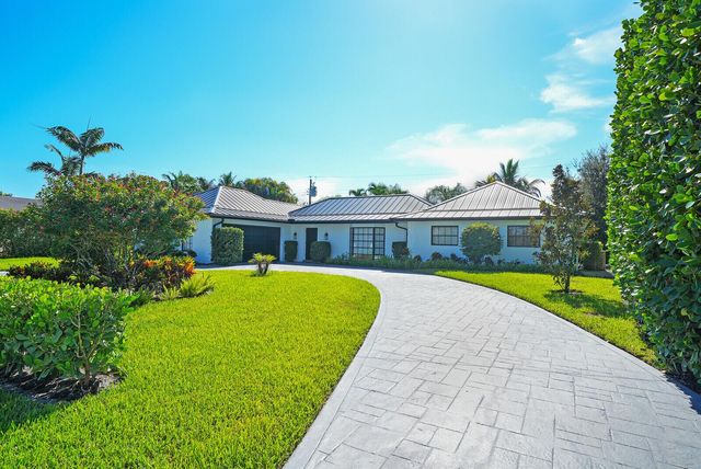 7 SE Paddock Circle, Jupiter, FL 33469