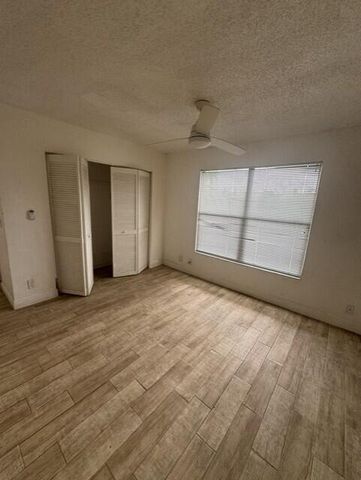 1495 LAKE CRYSTAL Drive G, West Palm Beach, FL 33411