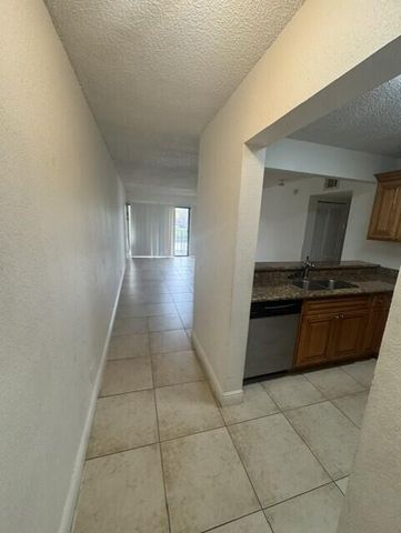 1495 LAKE CRYSTAL Drive G, West Palm Beach, FL 33411