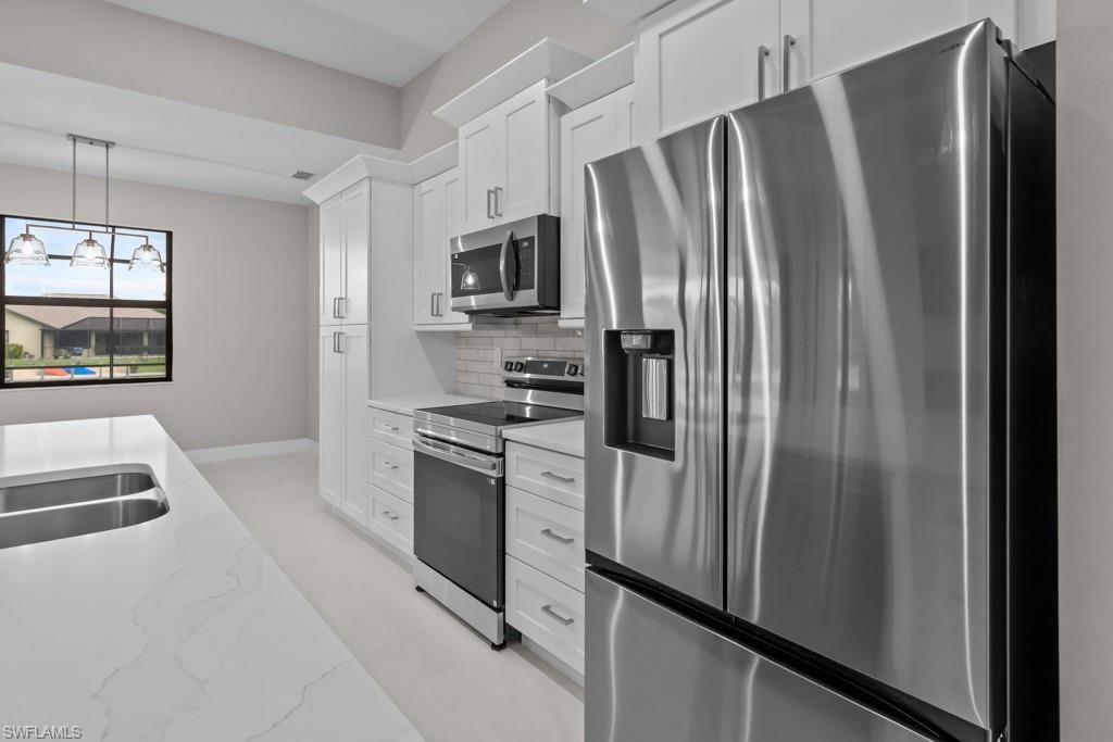 Image 10 of property listing at 3419 SW 5TH PL, Cape Coral, FL 33993