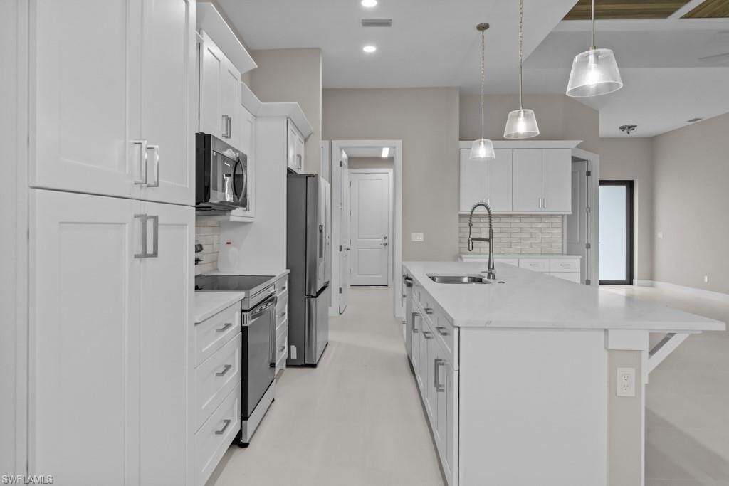 Image 11 of property listing at 3419 SW 5TH PL, Cape Coral, FL 33993