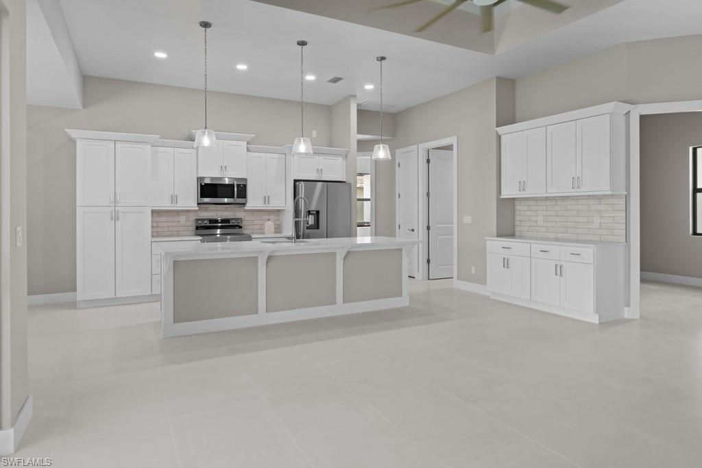 Image 6 of property listing at 3419 SW 5TH PL, Cape Coral, FL 33993