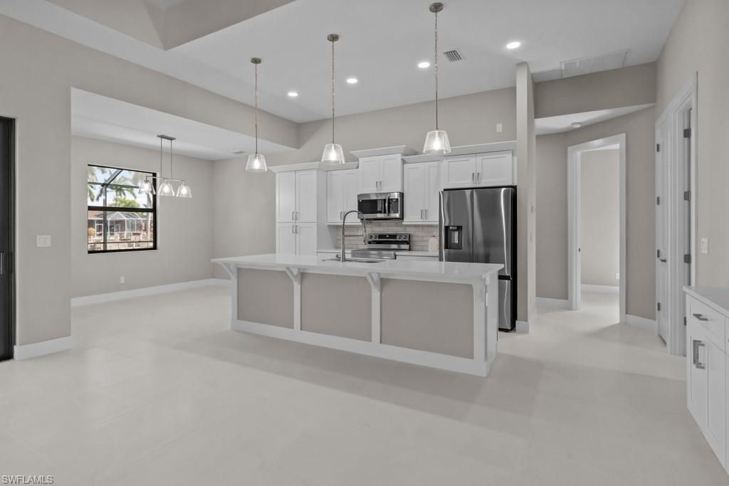 Image 8 of property listing at 3419 SW 5TH PL, Cape Coral, FL 33993