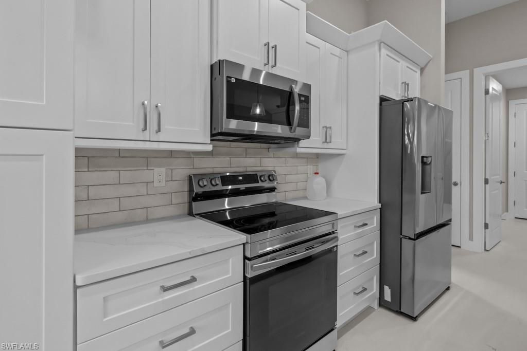 Image 9 of property listing at 3419 SW 5TH PL, Cape Coral, FL 33993