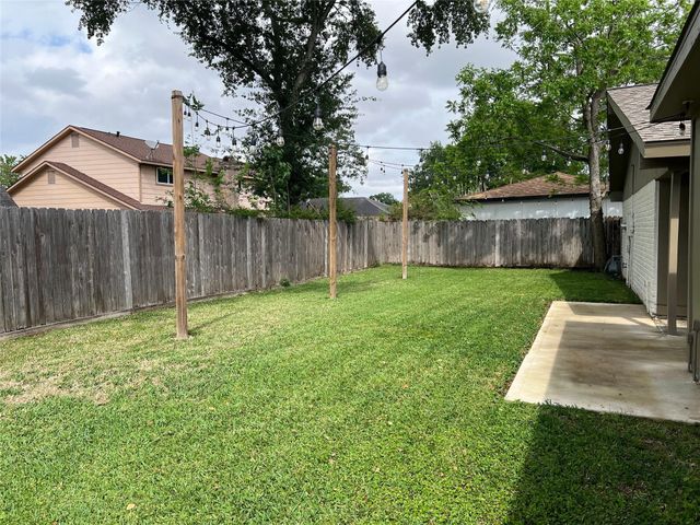 12314 Meadowhollow Drive, Meadows Place, TX 77477