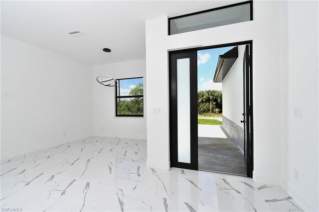 317 Lancelot AVE, Lehigh Acres, FL 33974