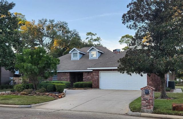 104 April Wind Drive S, Conroe, TX 77356