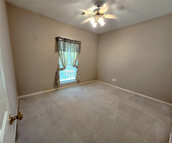 104 April Wind Drive S, Conroe, TX 77356