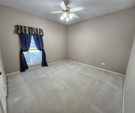 104 April Wind Drive S, Conroe, TX 77356