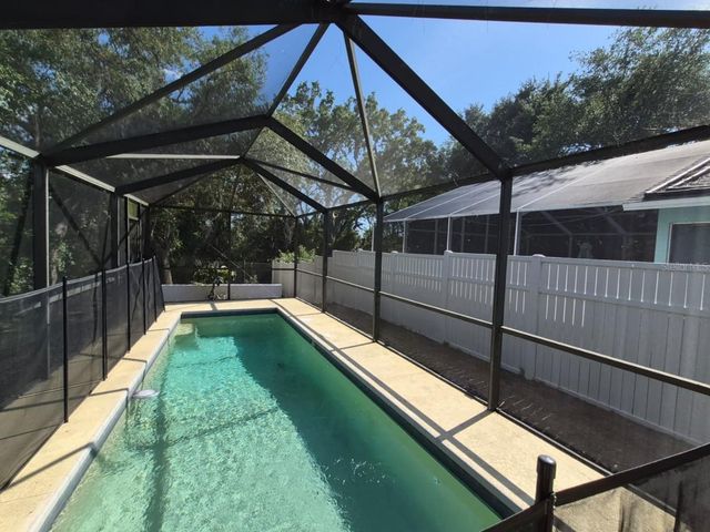 1448 WATERMILL CIRCLE, Tarpon Springs, FL 34689