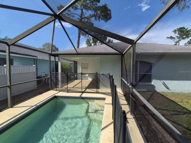 1448 WATERMILL CIRCLE, Tarpon Springs, FL 34689