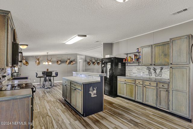 141 WOODS Road, San Mateo, FL 32187