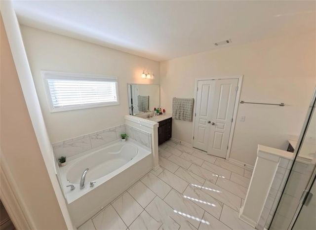 87 Round Pond Drive, Lilburn, GA 30047