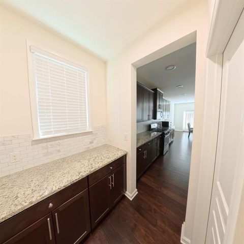 87 Round Pond Drive, Lilburn, GA 30047