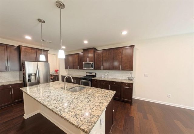 87 Round Pond Drive, Lilburn, GA 30047