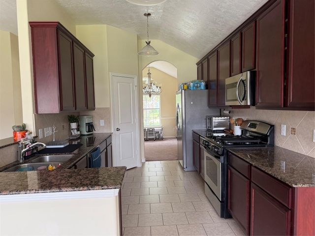 125 Long Canyon Lane, Richmond, TX 77469