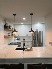 50 Emerald Woods DR A9, Naples, FL 34108
