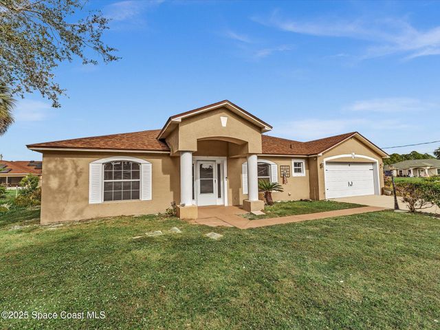 507 Fitzsimmons Street SW, Palm Bay, FL 32908