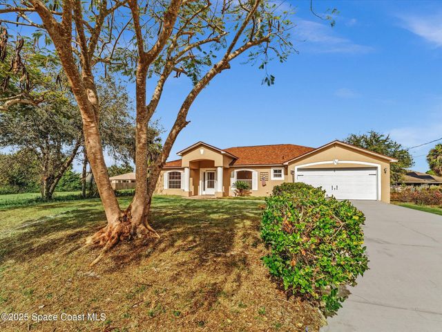 507 Fitzsimmons Street SW, Palm Bay, FL 32908