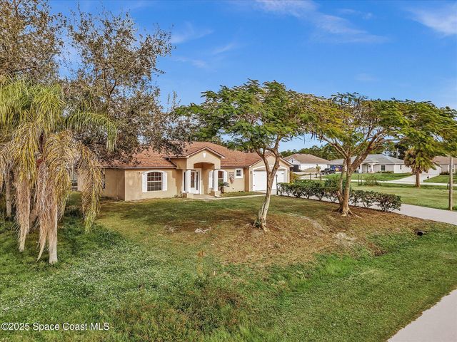 507 Fitzsimmons Street SW, Palm Bay, FL 32908