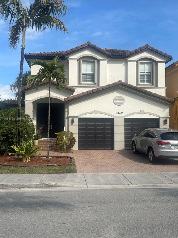 Image 1 of property listing at 7469 NW 112th Pl, Doral, FL 33178