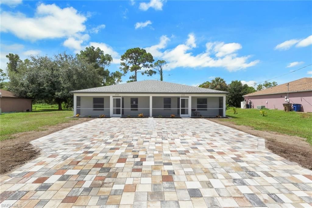 4733/4735 30th ST SW, LEHIGH ACRES, FL 33973 — exterior