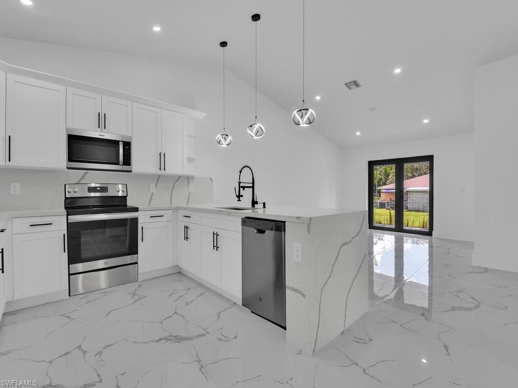 2440/2442 Richard AVE S, LEHIGH ACRES, FL 33973 — photo 5