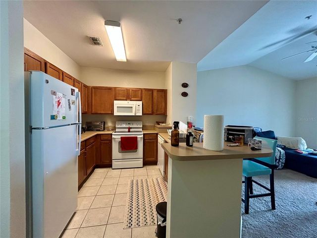 8112 CLAIRE ANN DRIVE 302, Orlando, FL 32825