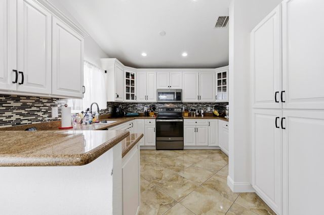 340 Hammocks Trail, Greenacres, FL 33413