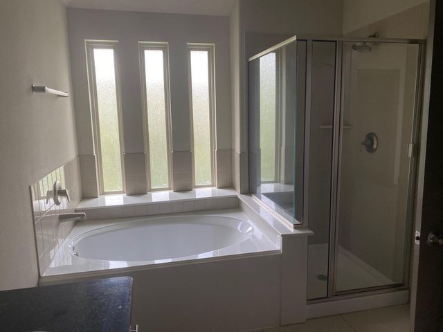 102 Aventura Place, The Woodlands, TX 77389