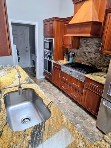 1028 TRADEWINDS DRIVE, Tarpon Springs, FL 34689