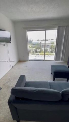 496 NW 165th St Rd D-611, Miami, FL 33169