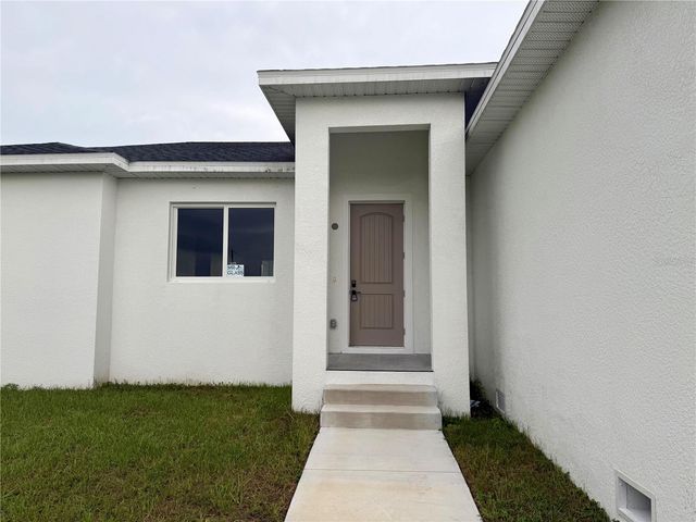571 MIMOSA AVENUE NW, Port Charlotte, FL 33952