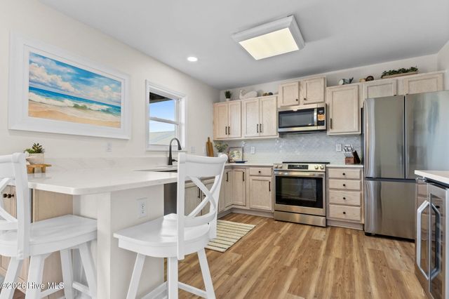 1116 E Beach Drive, Oak Island, NC 28465