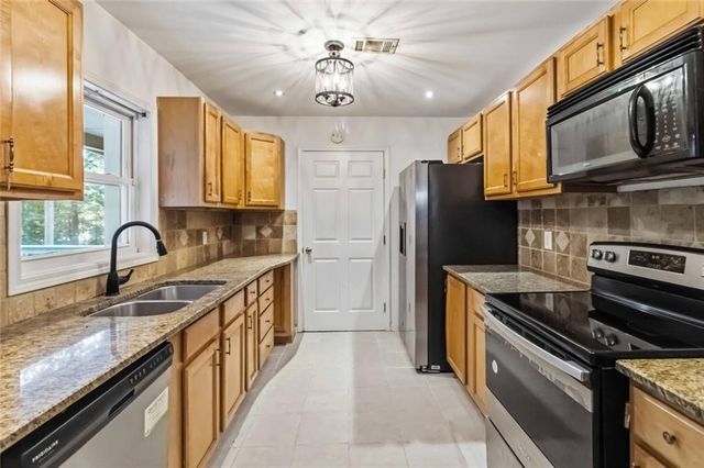3290 Stonewall Tell Road, Atlanta, GA 30349