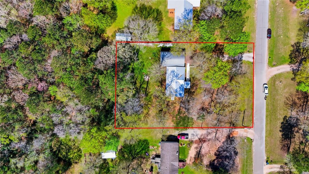 Image 34 of property listing at 4484 Grand Oaks Drive, Willis, TX 77378