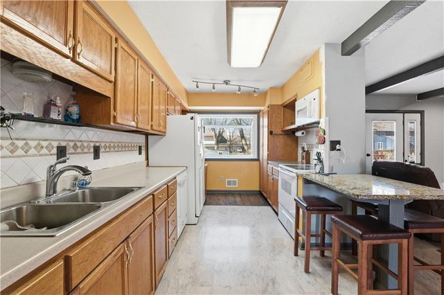 308 N Woodson Drive, Raymore, MO 64083