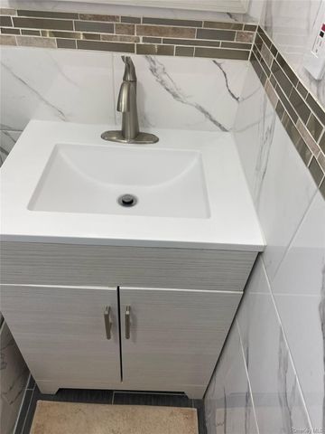 104-74 110th Street, Richmond Hill, NY 11419