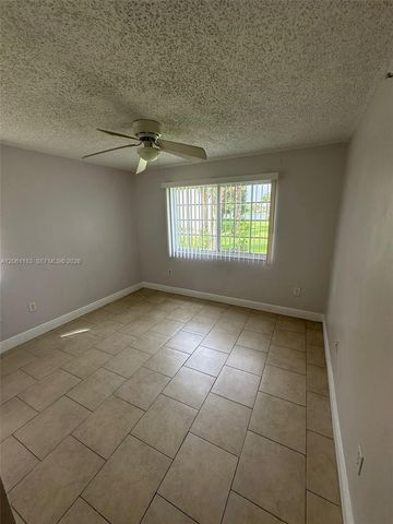 5005 Wiles Road 102, Coconut Creek, FL 33073