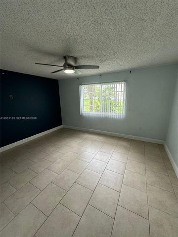 5005 Wiles Road 102, Coconut Creek, FL 33073