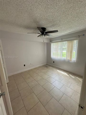 5005 Wiles Road 102, Coconut Creek, FL 33073