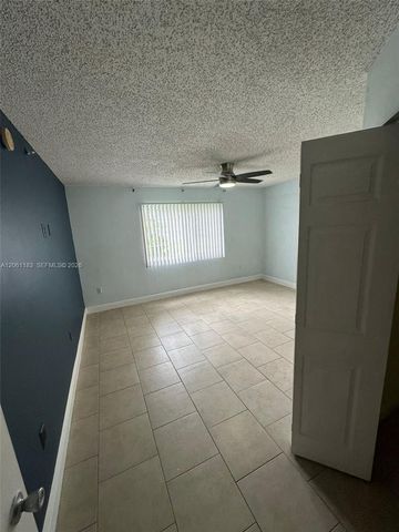 5005 Wiles Road 102, Coconut Creek, FL 33073