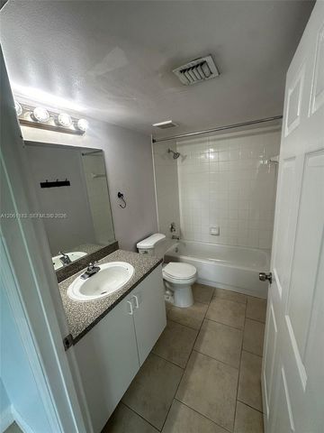 5005 Wiles Road 102, Coconut Creek, FL 33073