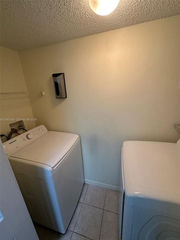 5005 Wiles Road 102, Coconut Creek, FL 33073